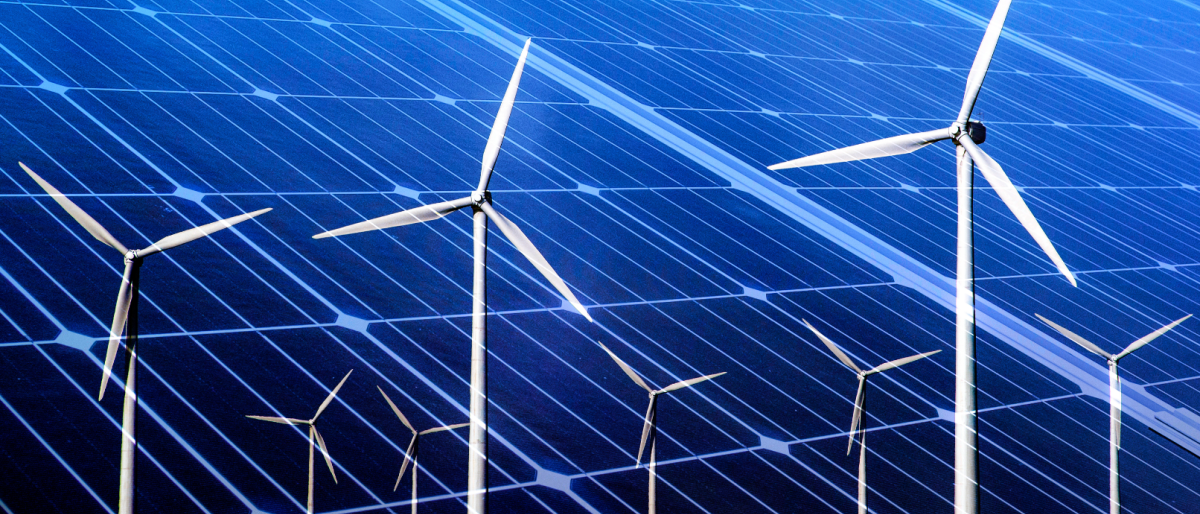 Windmills over solar panels